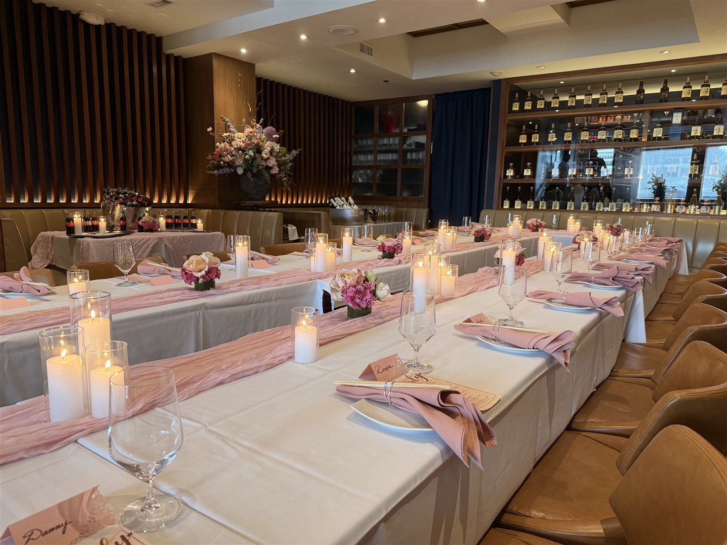 A candlelit event table from the MŌLI Events website.
